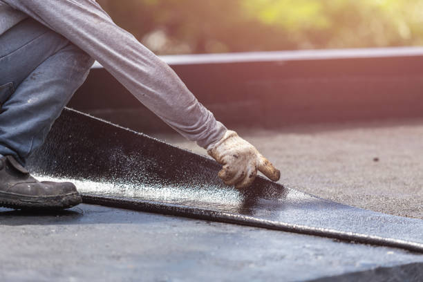 Professional Waterproofing technician working in Melrose Park, NY